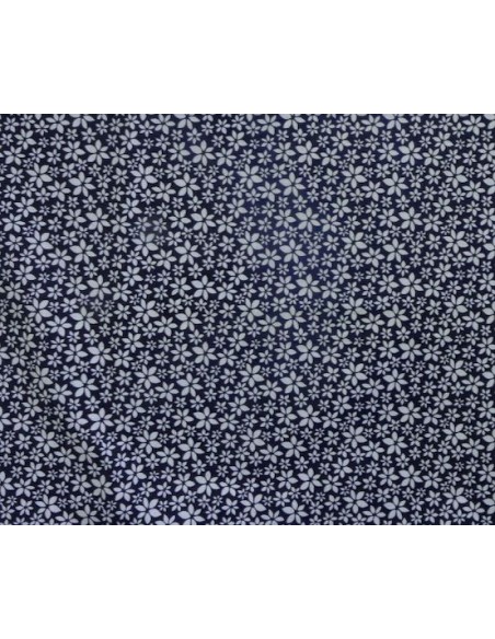 Tissu coton à petite fleur blanche sur fond bleu marine - vendu au mètre