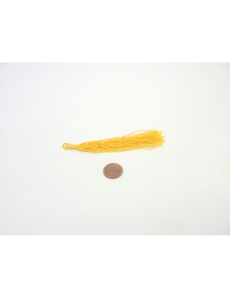 Pompon en polyester jaune brillant 10cm
