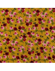Tissus double gaze de coton motif rose sur fond ocre - vendu au mètre