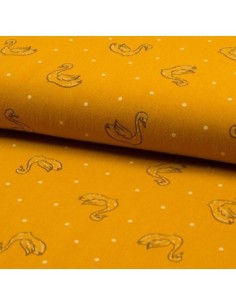 Tissus coton lavé motif Swan le Cygne sur fond jaune ocre - vendu au mètre