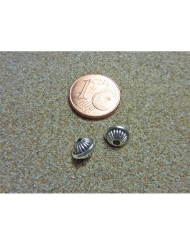 Perle ronde toupie 7mm en métal argenté