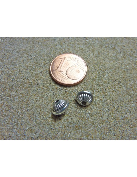 Perle ronde toupie 7mm en métal argenté