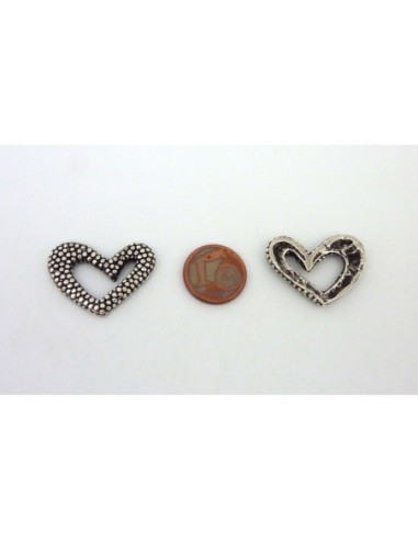 Perle connecteur coeur en métal argenté travaillé