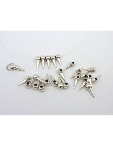 25 clous, pointes, breloque 14mm en métal...