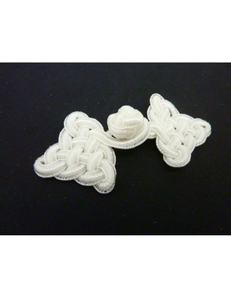 Bouton brandebourg ivoire passementerie