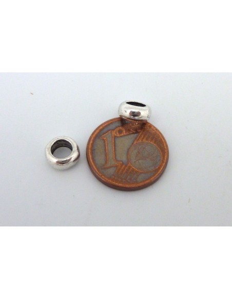 perle rondelle en métal argenté pour cordon 