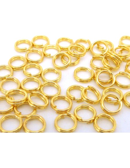 R-5g - Environ 75 anneaux de jonction double 5mm en métal doré