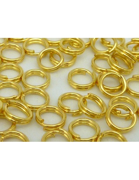 R-5g - Environ 75 anneaux de jonction double 5mm en métal doré