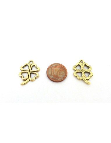 Breloque porte bonheur doré pâle en métal