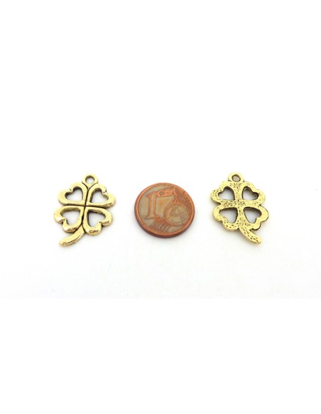 Breloque porte bonheur doré pâle en métal