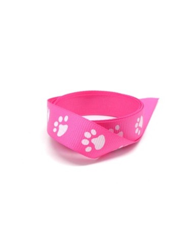 Galon fantaisie rose vif 15mm empreinte patte de chien blanche