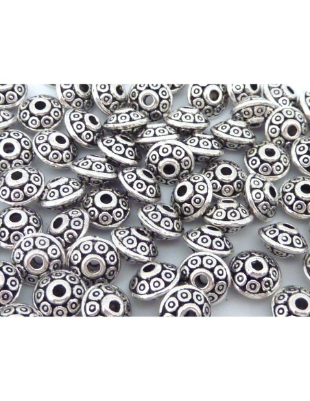 Perles toupie en métal argenté gravé de petits ronds