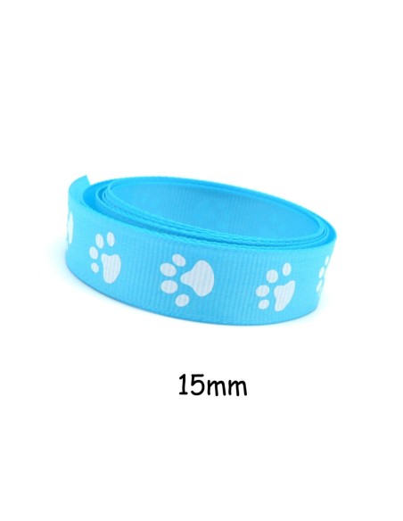 Galon plat 15mm empreinte patte de chat blanche sur fond bleu azur Galon plat 15mm empreinte patte de chat blanche sur fond bleu azur
