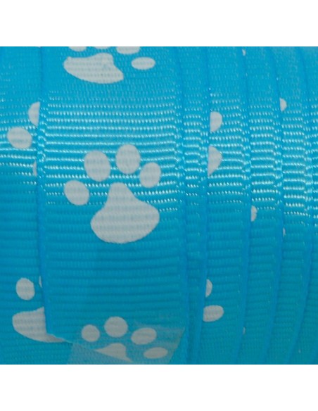 Ruban fantaisie bleu azur 15mm empreinte patte de chat blanche Ruban fantaisie bleu azur 15mm empreinte patte de chat blanche