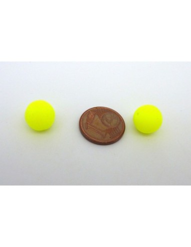 2 perles rondes 10mm en verre de couleur jaune...